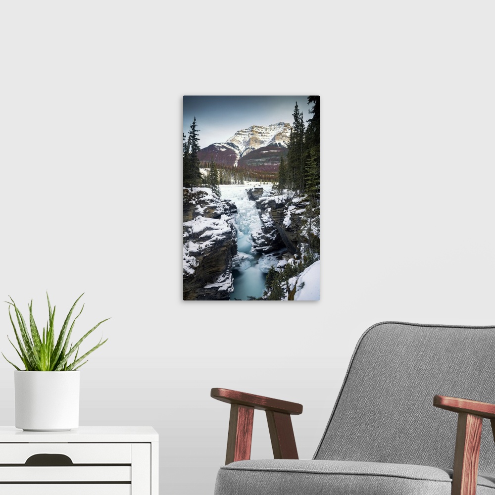A modern room featuring Athabasca Falls in Winter,  Alberta, Canada.