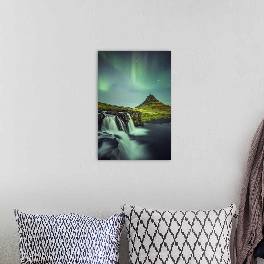 A bohemian room featuring Long exposure landscape with waterfalls and aurora borealis above Kirkjufell Mountain, Snaefellsn...