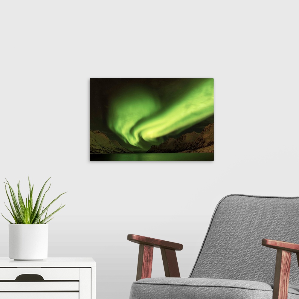 A modern room featuring Aurora Borealis, Northern Lights, Troms region, Norway