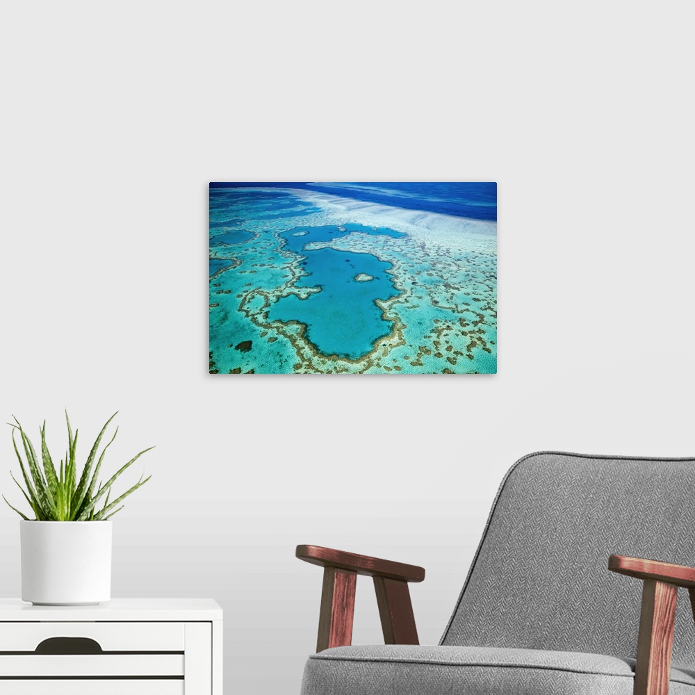 A modern room featuring Australia, Queensland, Whitsundays, Great Barrier Reef Marine Park. Aerial view of Heart Reef, a ...