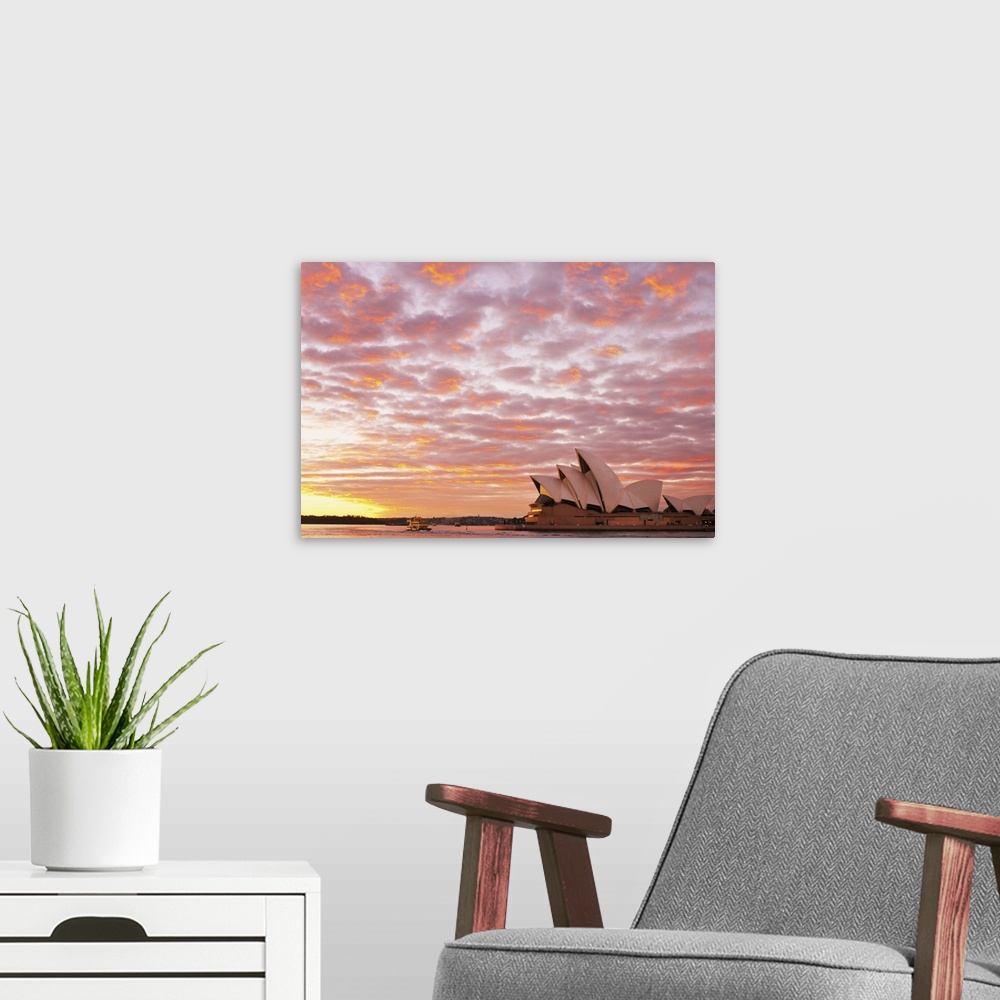 A modern room featuring Australia, New South Wales, Sydney, Sydney Opera House, Boat in harbour at Sunrise