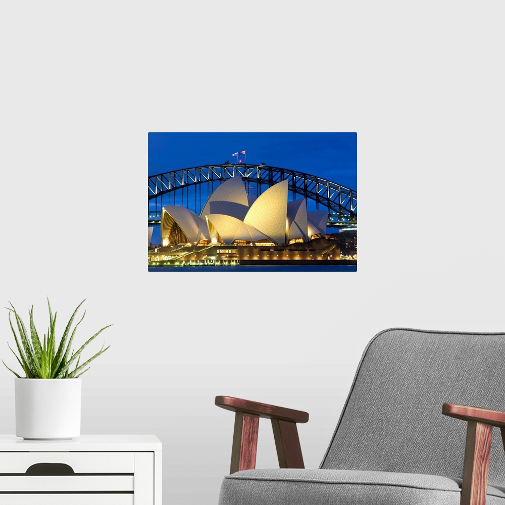 A modern room featuring Australia, Sydney, Opera House at dusk