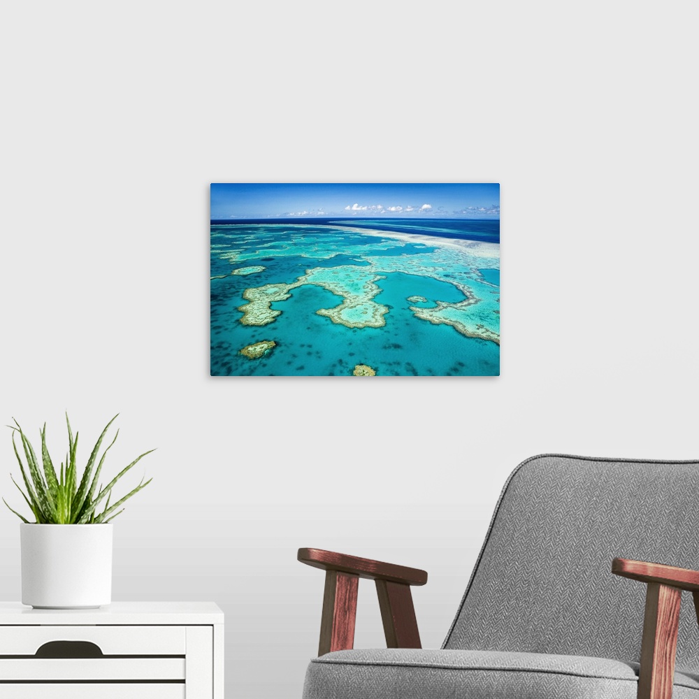 A modern room featuring Australia, Queensland, Whitsundays, Great Barrier Reef Marine Park. Aerial view of coral formatio...