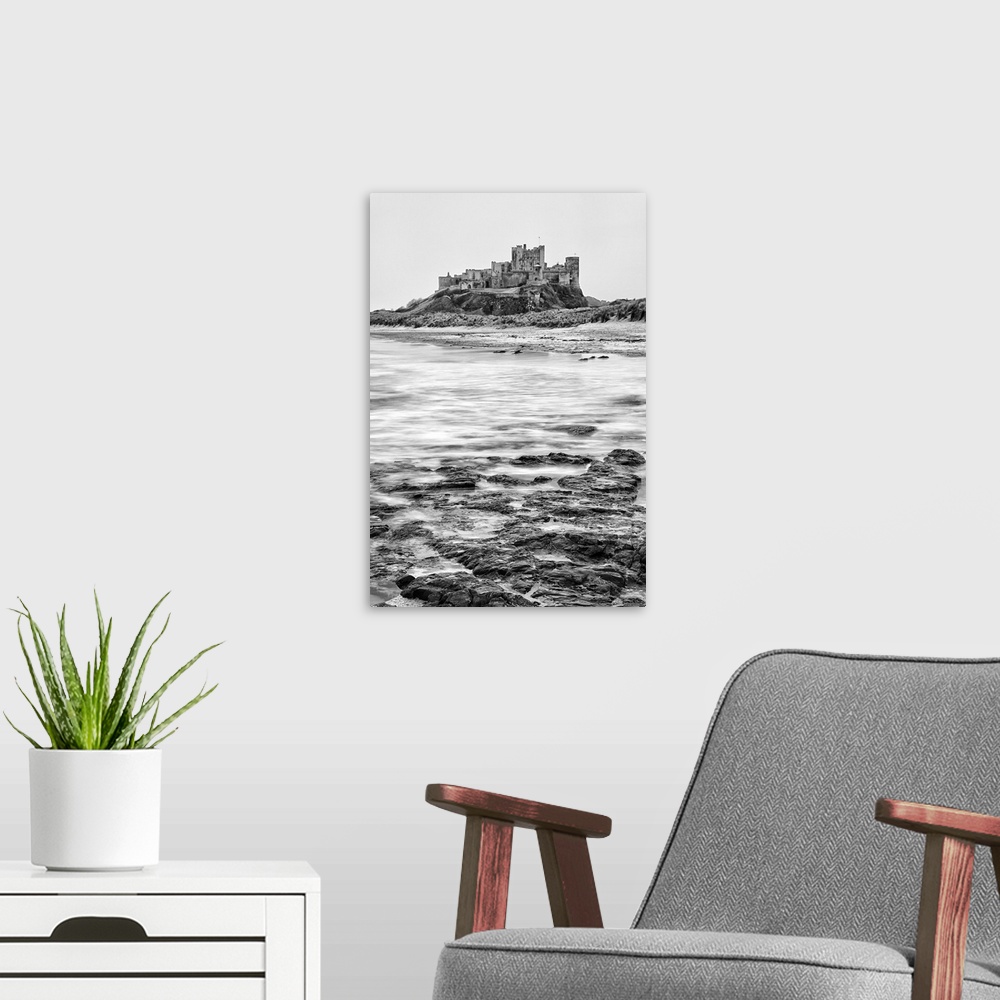 A modern room featuring Bamburgh castle, Northumberland, UK