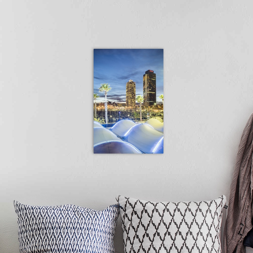A bohemian room featuring Barcelona, Catalonia, Spain, Southern Europe. The twin towers of Mapfre Tower and Hotel Art at dusk.