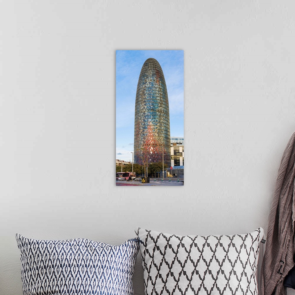 A bohemian room featuring Barcelona, Catalonia, Spain, Southern Europe. Vertical panoramic view of the Agbar Tower.