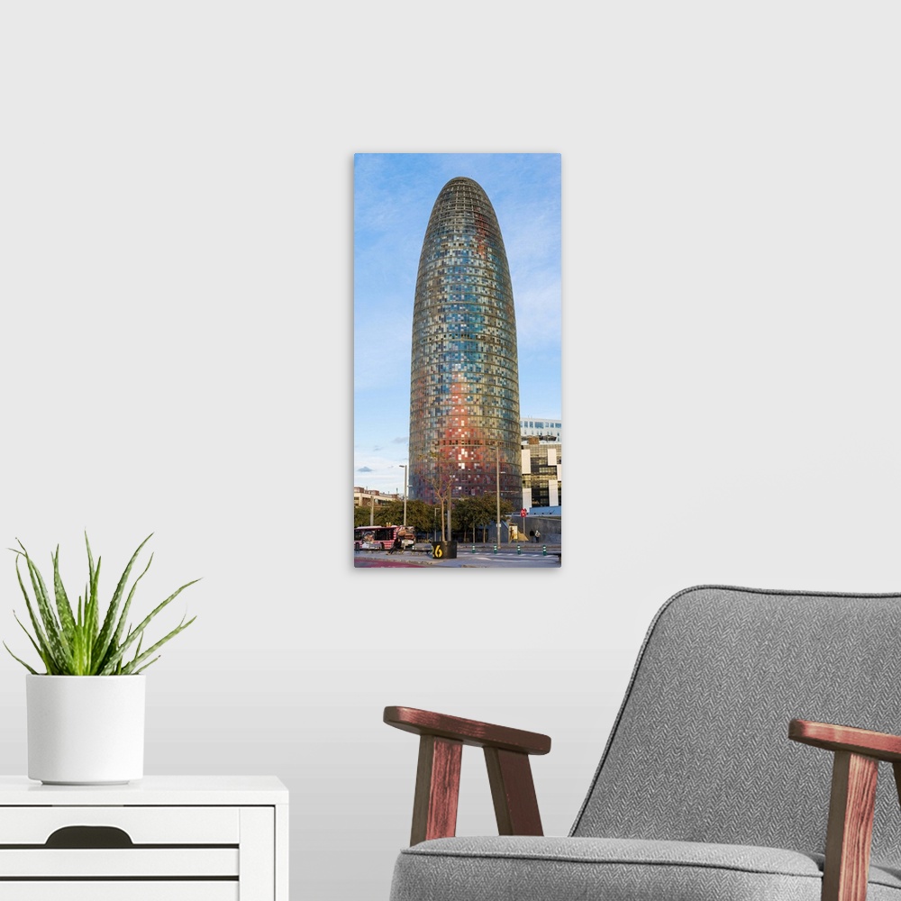 A modern room featuring Barcelona, Catalonia, Spain, Southern Europe. Vertical panoramic view of the Agbar Tower.