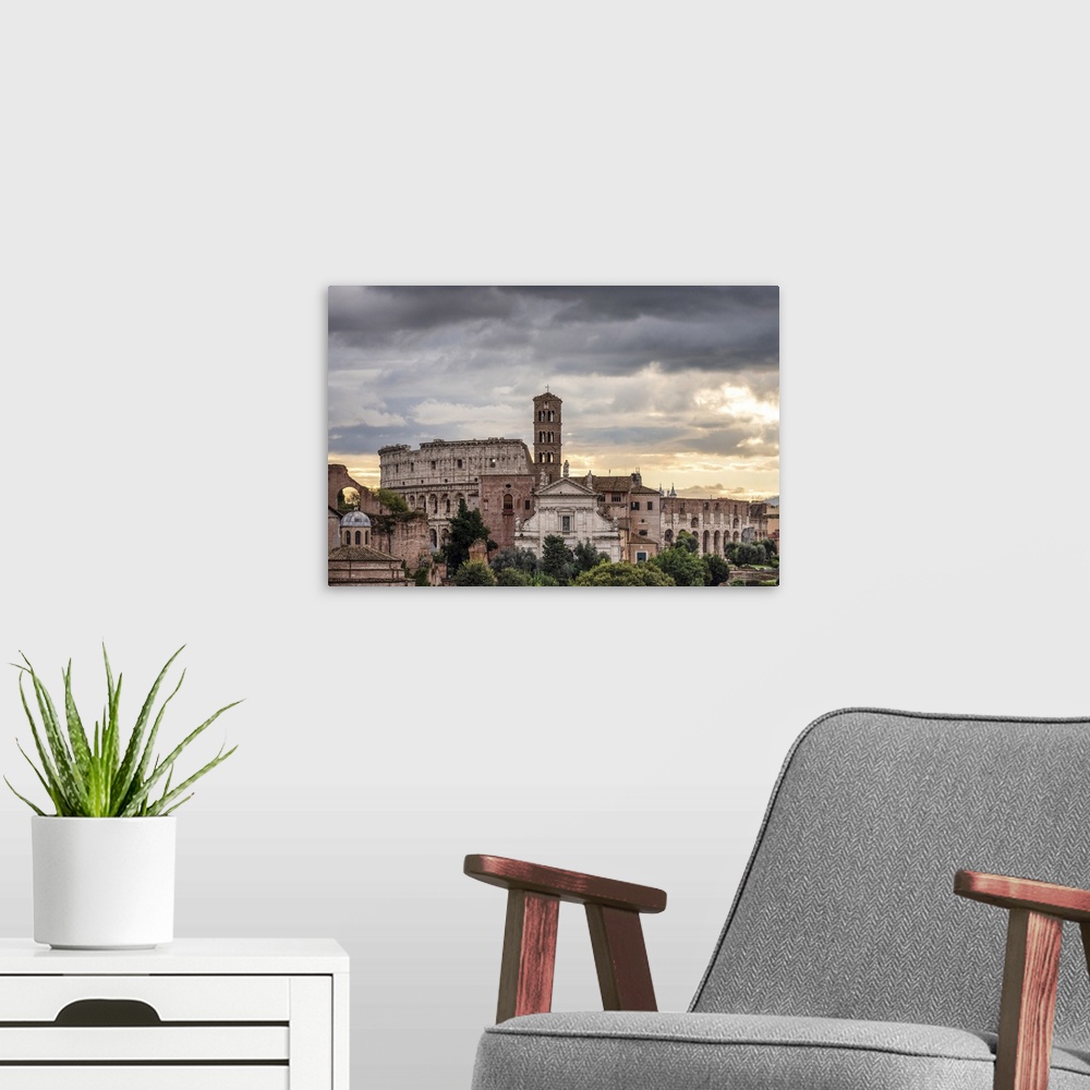 A modern room featuring Basilica of Santa Francesca Romana and Coliseum at sunrise, Rome, Lazio, Italy, Europe,