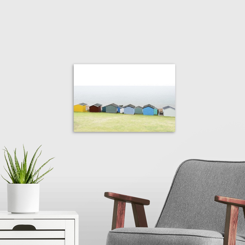 A modern room featuring Beach huts on Tankerton beach, near Whitstable, Kent, England