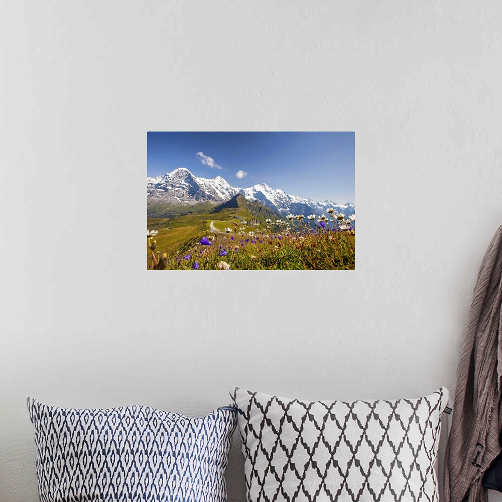 A bohemian room featuring Colorful flowers framing Mount Eiger Mannlichen Grindelwald Bernese Oberland Canton of Berne Swit...
