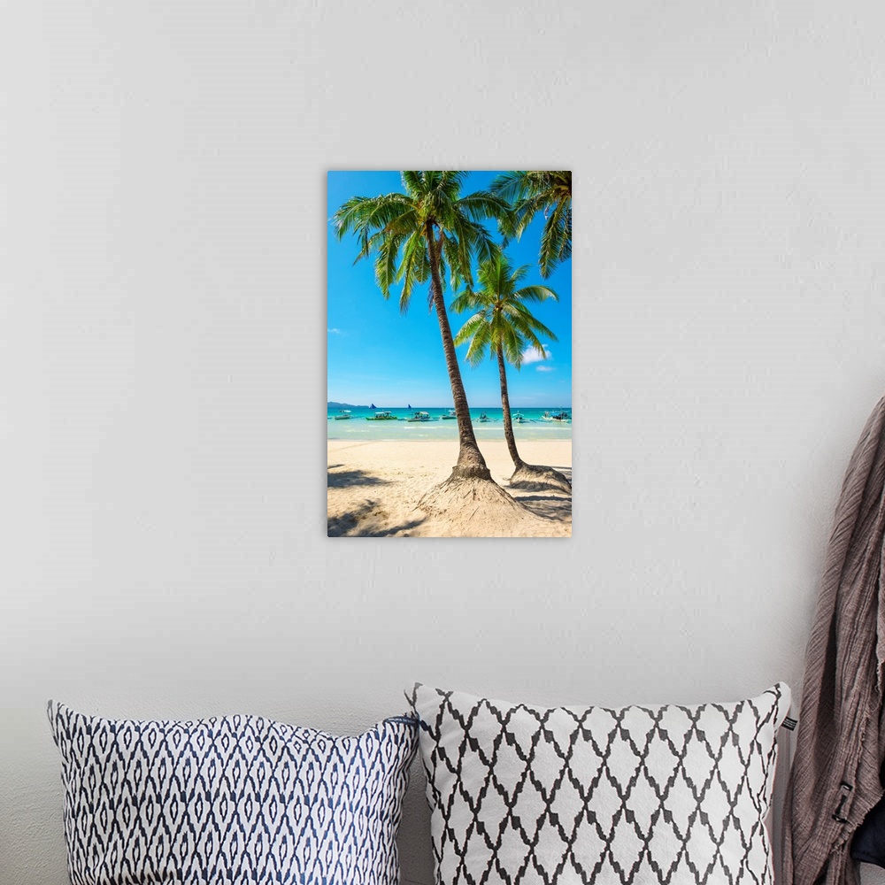 A bohemian room featuring Boats and palm trees on White Beach, Boracay Island, Aklan Province, Western Visayas, Philippines.