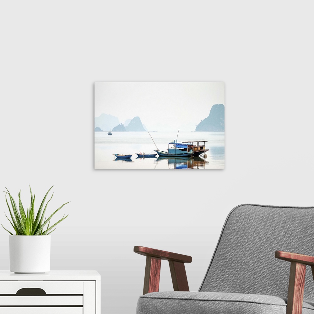 A modern room featuring Boats in Bai Tu Long Bay on a foggy day, Cai Rong, Quang Ninh Province, Vietnam.