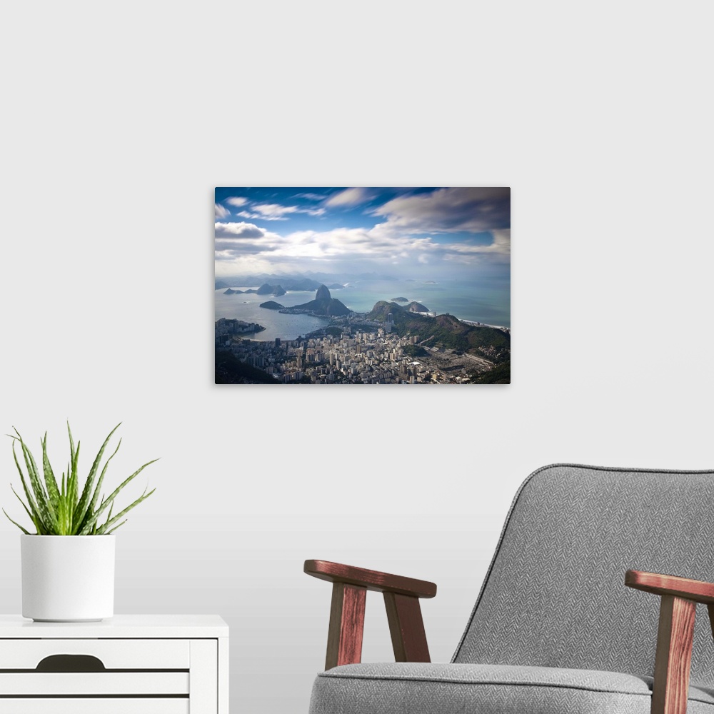 A modern room featuring Brazil, Rio De Janeiro, Cosme Velho, View of Sugar Loaf mountain, Botafogo Bay and Copacabana  fr...
