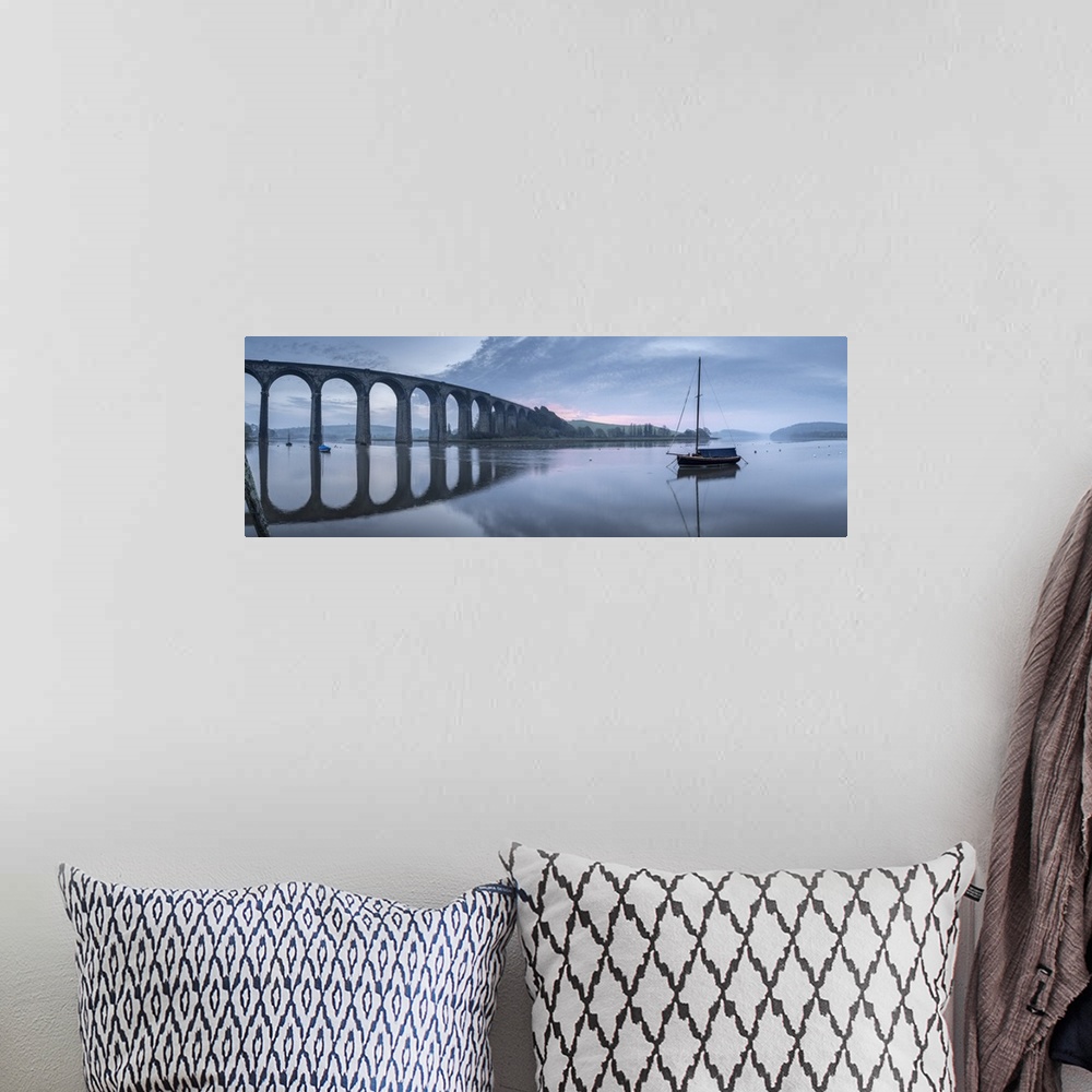 A bohemian room featuring Brunel's St German's Viaduct at dawn, St German's, Cornwall, England. Spring (March) 2021.