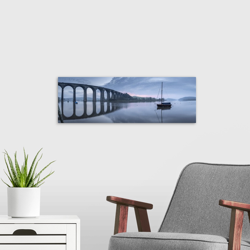A modern room featuring Brunel's St German's Viaduct at dawn, St German's, Cornwall, England. Spring (March) 2021.