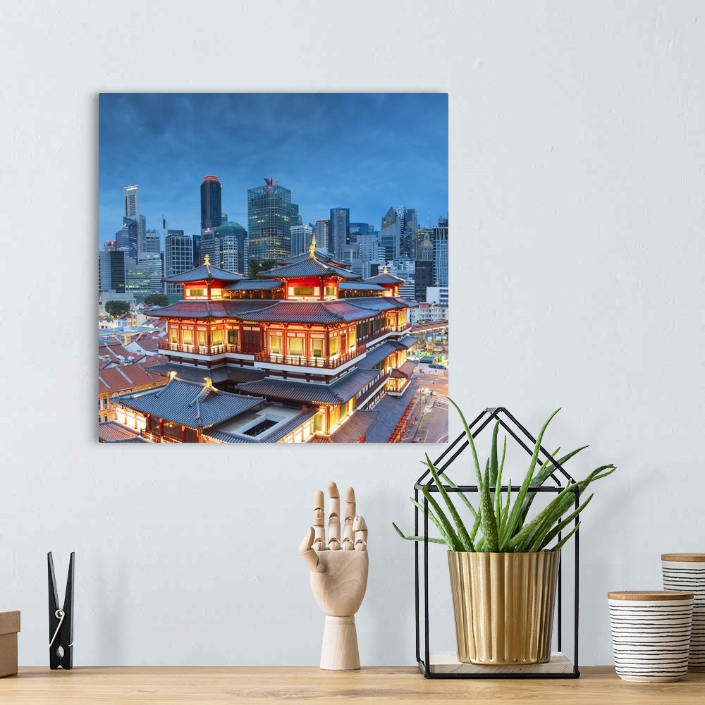A bohemian room featuring Buddha Tooth Relic Temple and skyscrapers, Chinatown, Singapore.