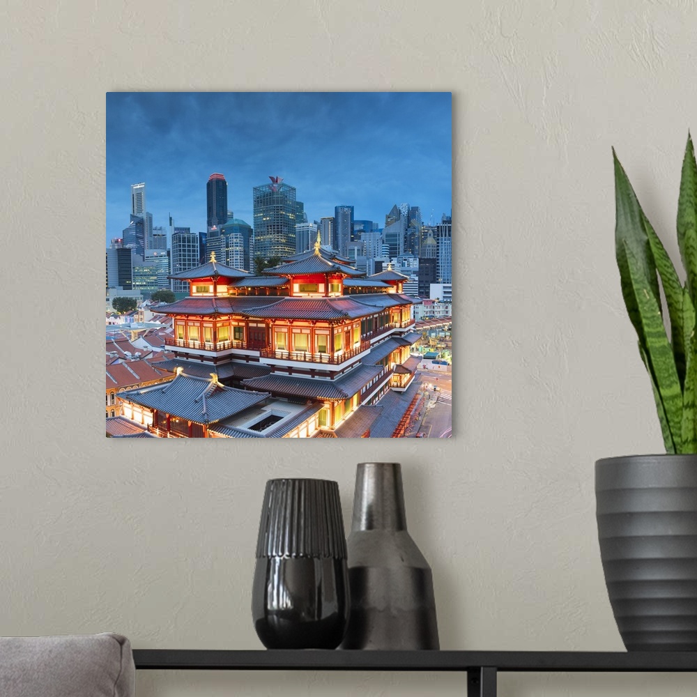 A modern room featuring Buddha Tooth Relic Temple and skyscrapers, Chinatown, Singapore.
