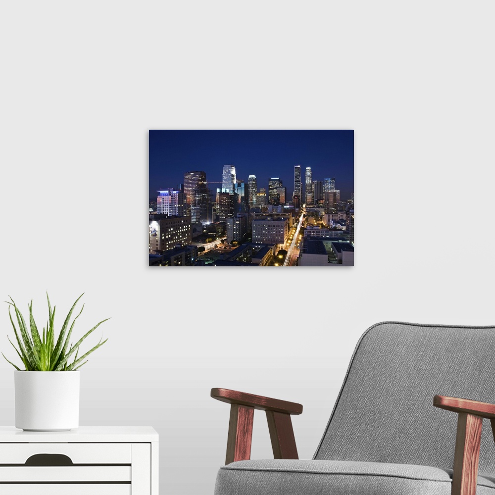 A modern room featuring USA, California, Los Angeles, aerial view of downtown from West 11th Street, dusk