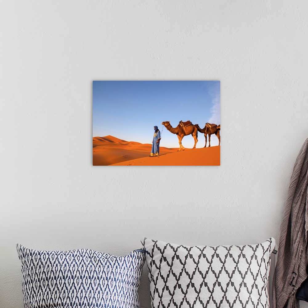 A bohemian room featuring Camel Driver, Sahara Desert, Merzouga, Morocco, (MR)