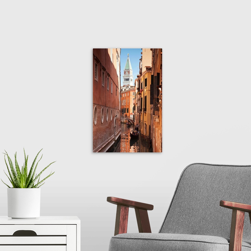 A modern room featuring Campanile and gondola on canal in Venice, Italy