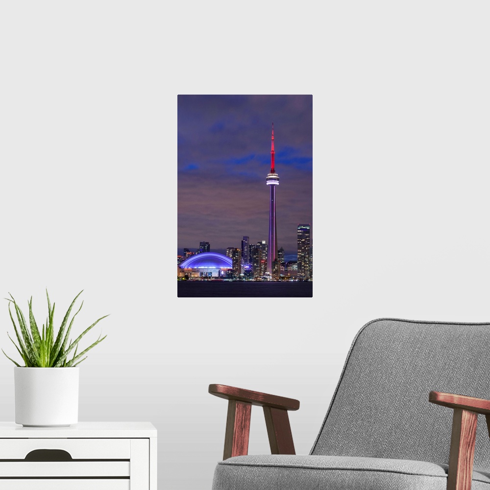 A modern room featuring Canada, Ontario, Toronto, Harbourfront, CN Tower, Rogers Centre, and skyline from Olympic Island,...