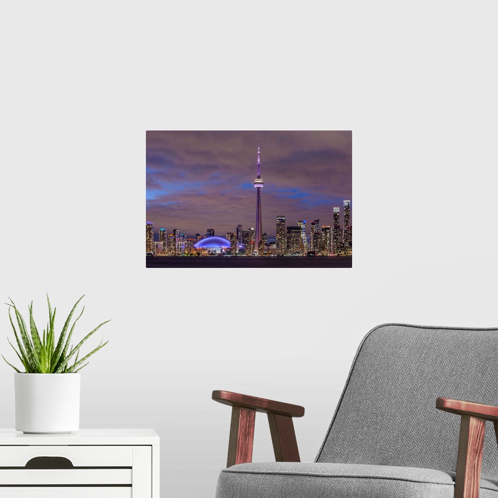 A modern room featuring Canada, Ontario, Toronto, Harbourfront, CN Tower, Rogers Centre, and skyline from Olympic Island,...