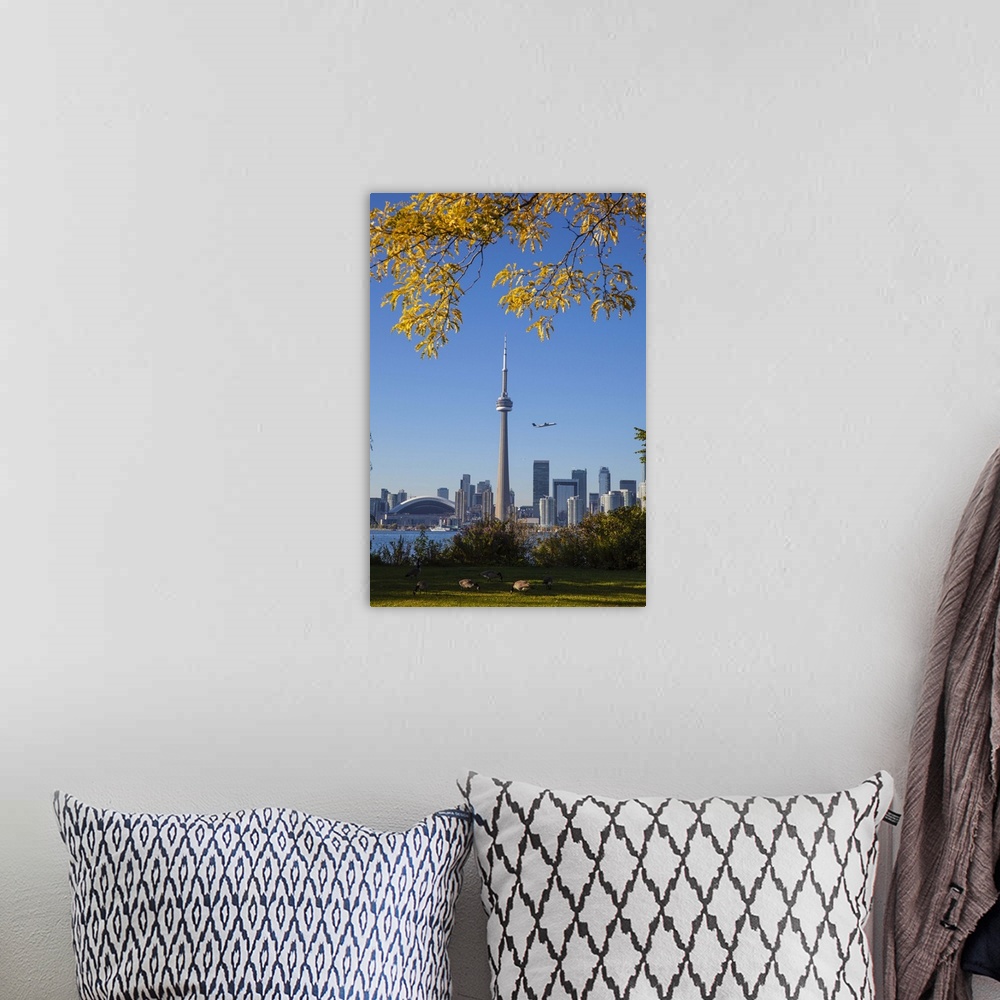 A bohemian room featuring Canada, Ontario, Toronto, View of CN Tower and city skyline from Center Island