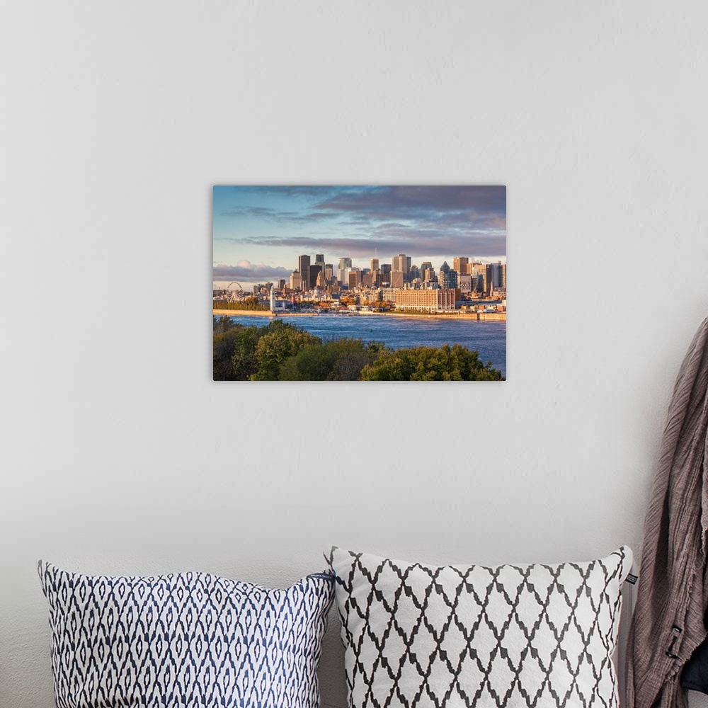 A bohemian room featuring Canada, Quebec, Montreal, Elevated City Skyline From The St. Lawrence River, Dawn
