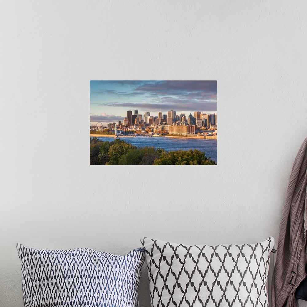 A bohemian room featuring Canada, Quebec, Montreal, Elevated City Skyline From The St. Lawrence River, Dawn