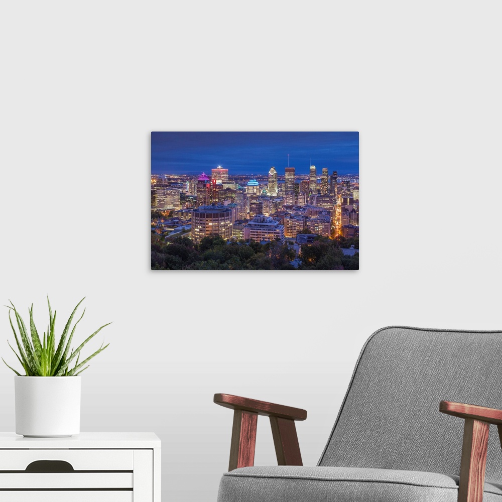 A modern room featuring Canada, Quebec, Montreal, Elevated Skyline From Mount Royal, Dusk