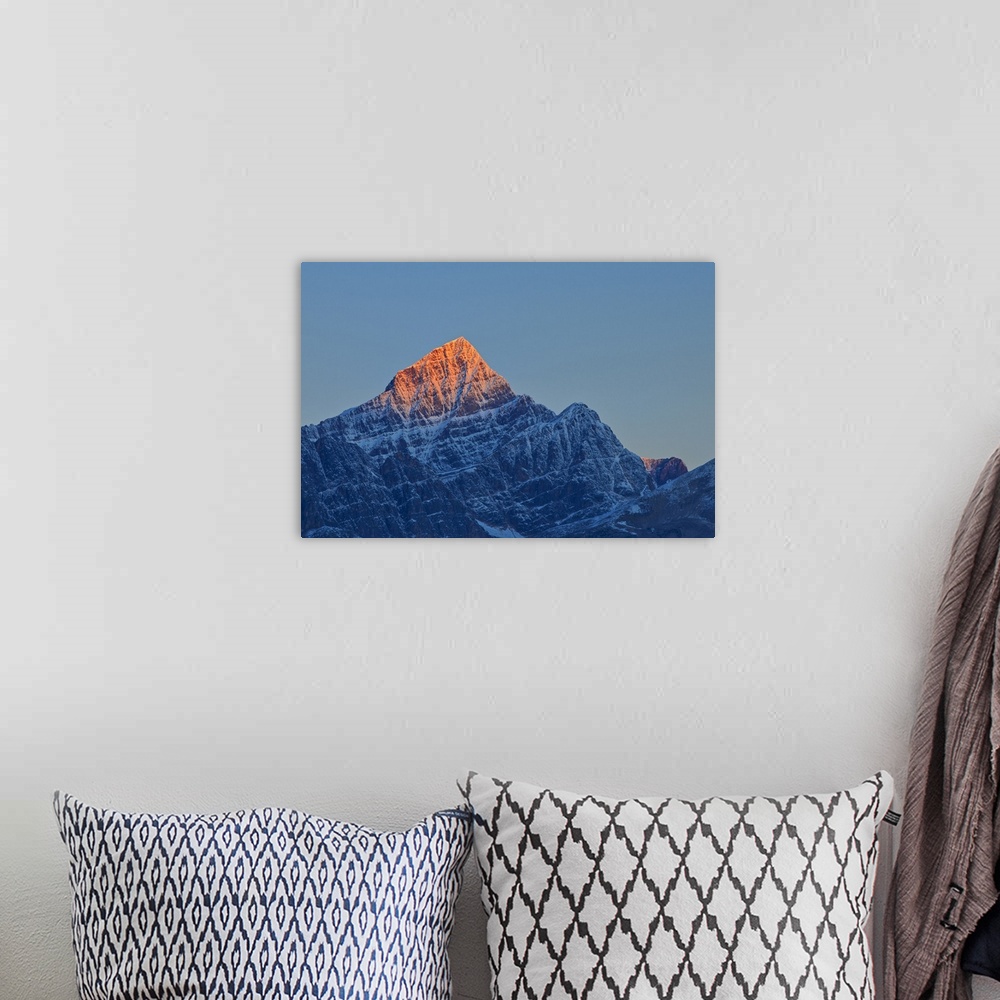 A bohemian room featuring First light on a peak of the Canadina Rocky Mountains, Icefields Parkway, Jasper National Park, A...