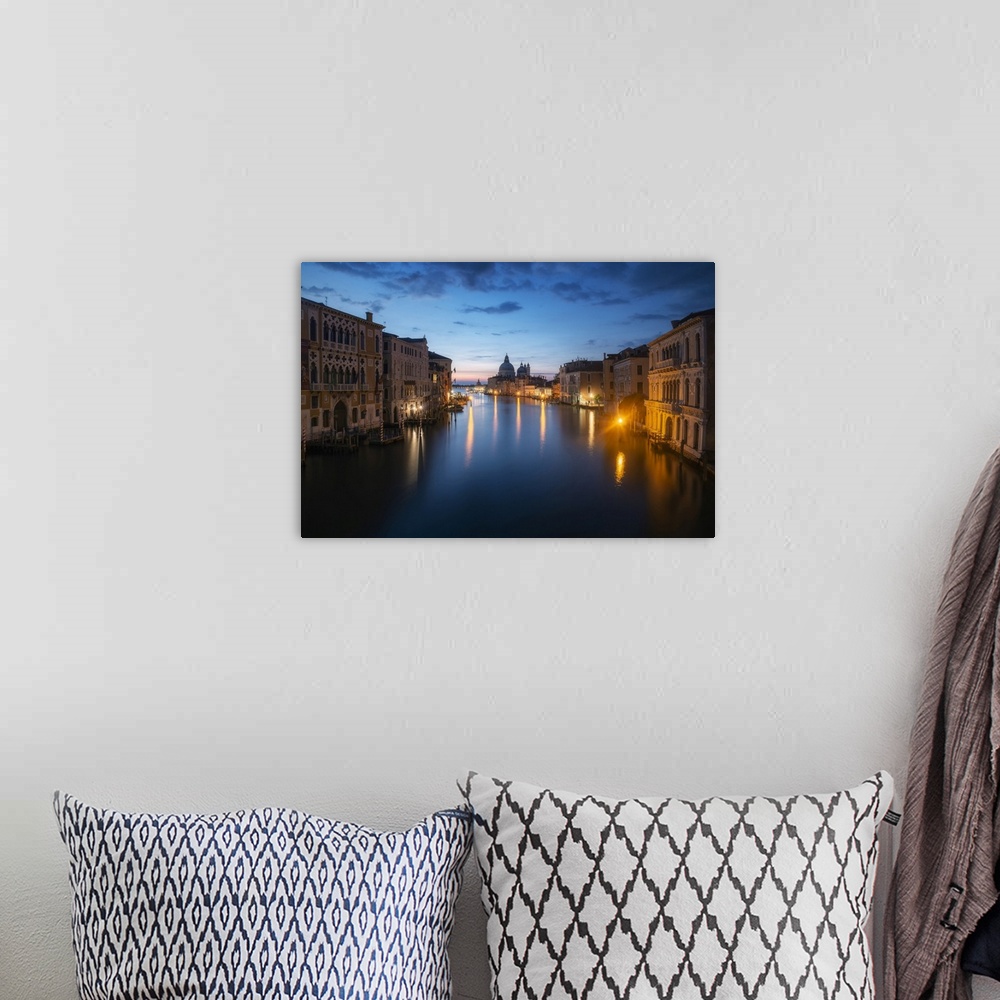 A bohemian room featuring Canal Grande from the Accademia Bridge, with the Salute in the background. Venice, Italy.
