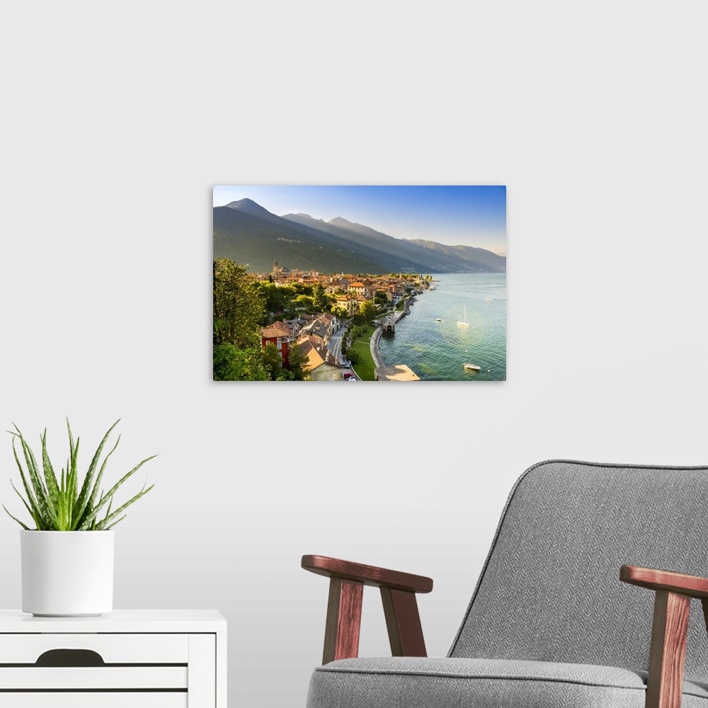 A modern room featuring Cannobio, Verbano-Cusio-Ossola, Lake Maggiore, Piedmont, Italy. High angle view over the old town...