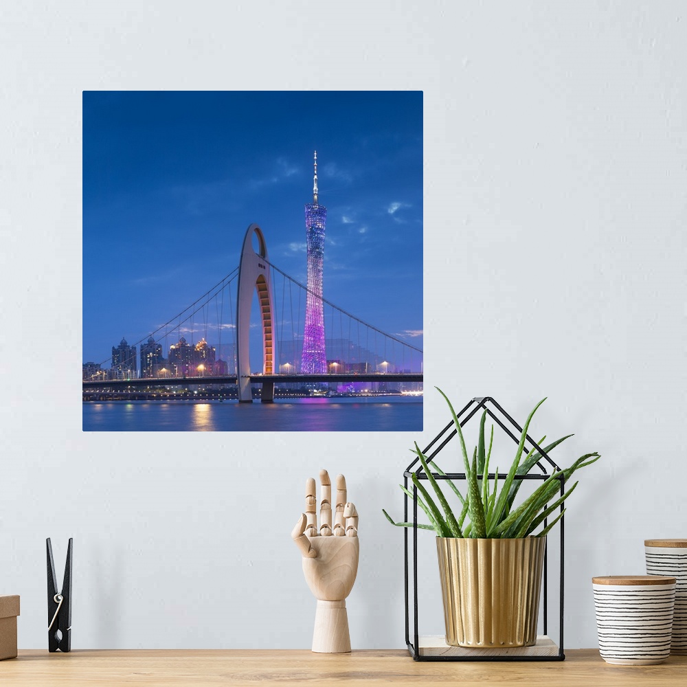 A bohemian room featuring Canton Tower and Liede Bridge at dusk, Guangzhou, Guangdong, China