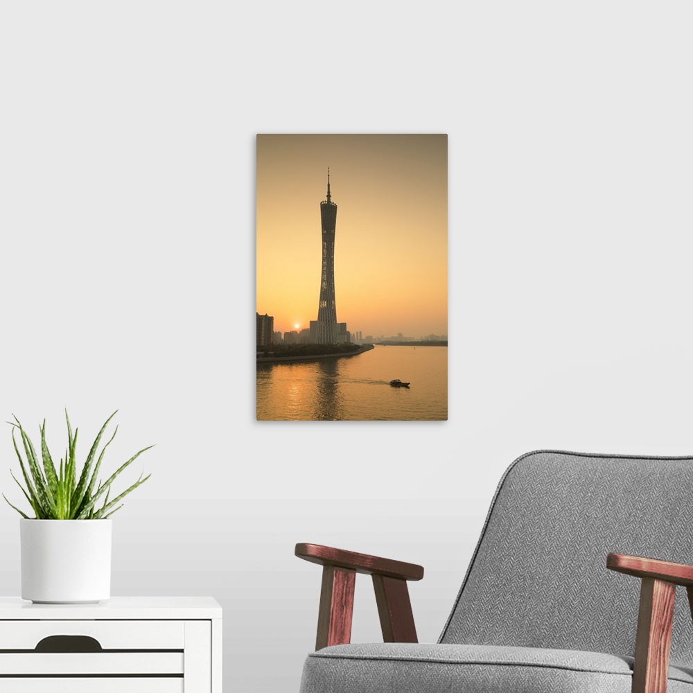 A modern room featuring Canton Tower at sunset, Tianhe, Guangzhou, Guangdong, China.
