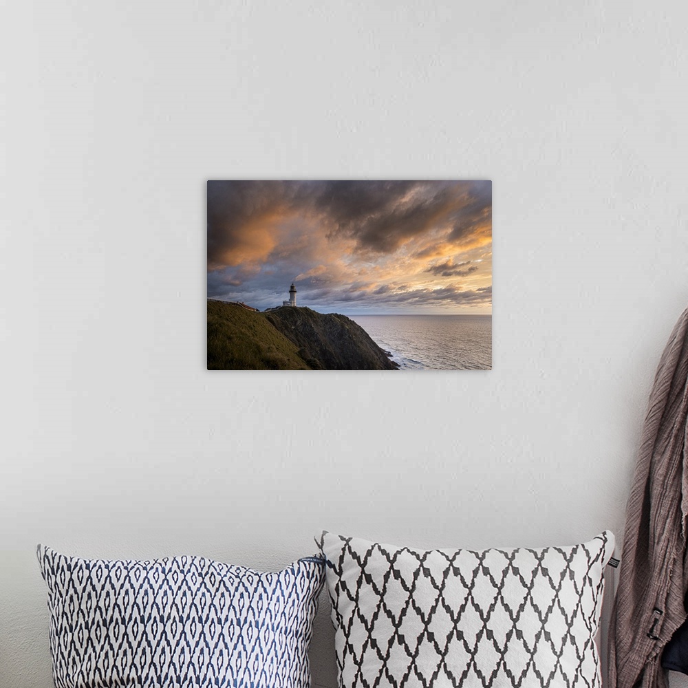 A bohemian room featuring Cape Byron Lighthouse at sunrise, Byron Bay, New South Wales, Australia.