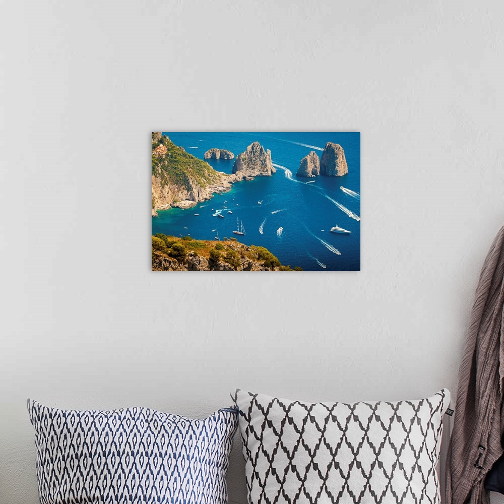 A bohemian room featuring Capri island, Naples, Italy. Aerial view of Faragliioni and coastline from Anacapri.
