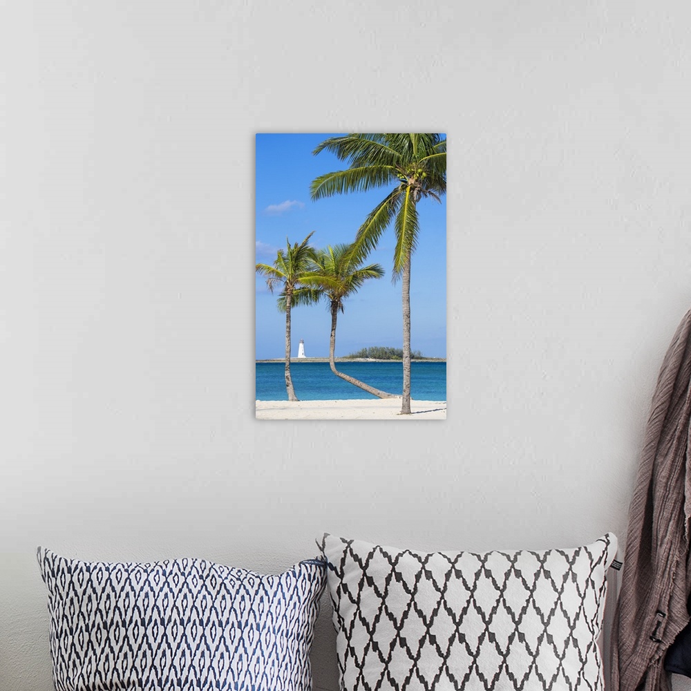 A bohemian room featuring Caribbean, Bahamas, Providence Island, Nassau, Palm trees on white sand beach with lighthouse in ...
