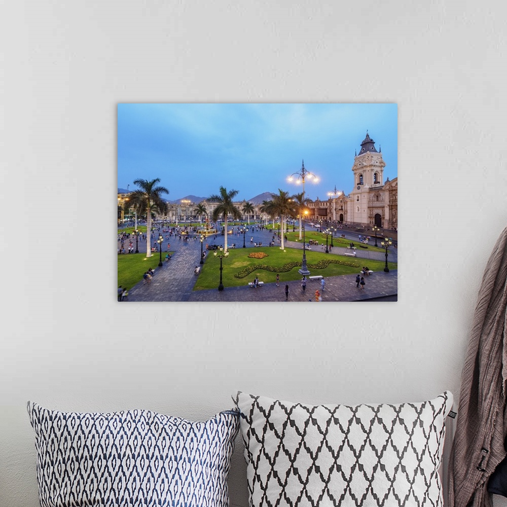 A bohemian room featuring Cathedral and Plaza de Armas at twilight, elevated view, Lima, Peru