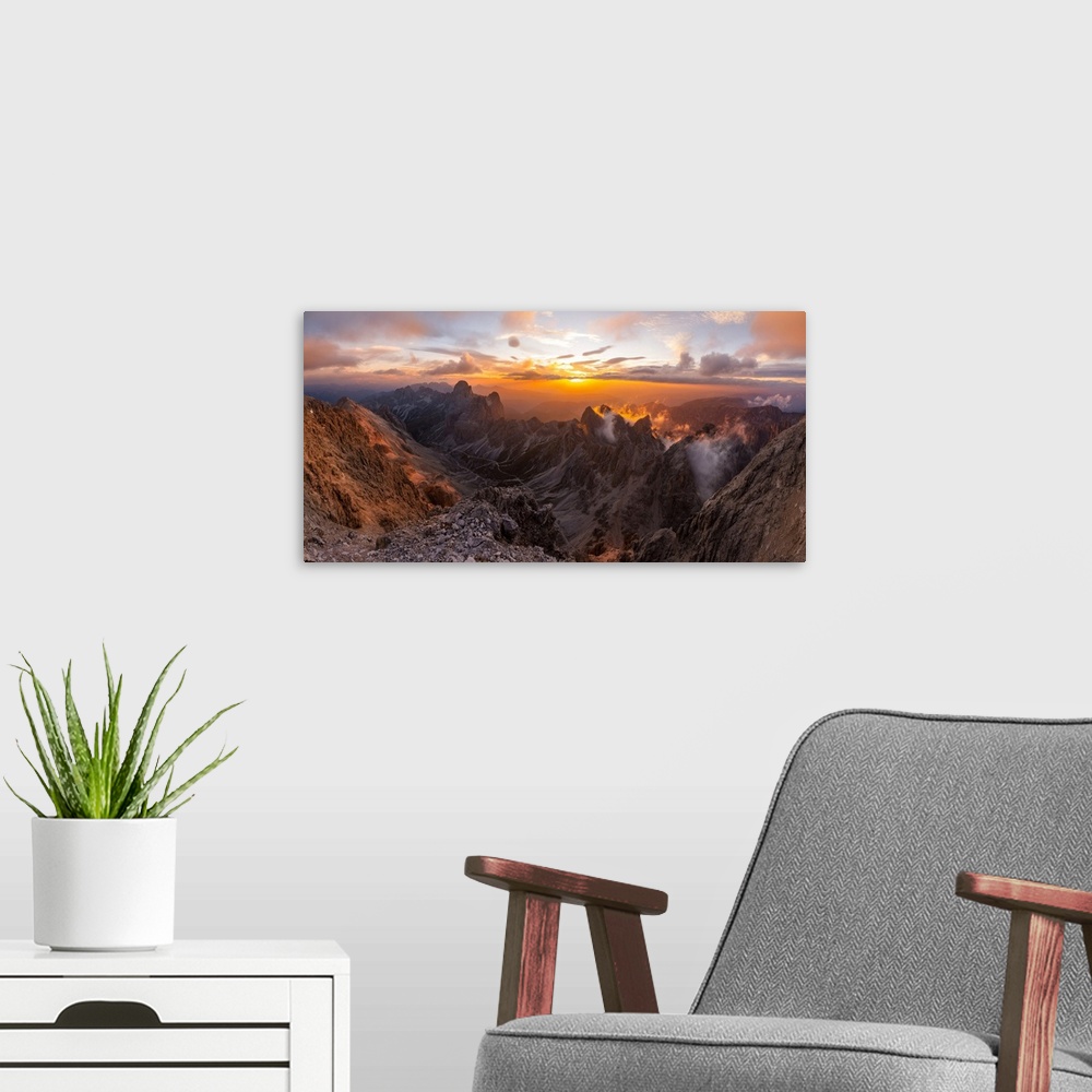 A modern room featuring Catinaccio group panorama from Catinaccio di Antermoia summit during a summer sunset over mountai...