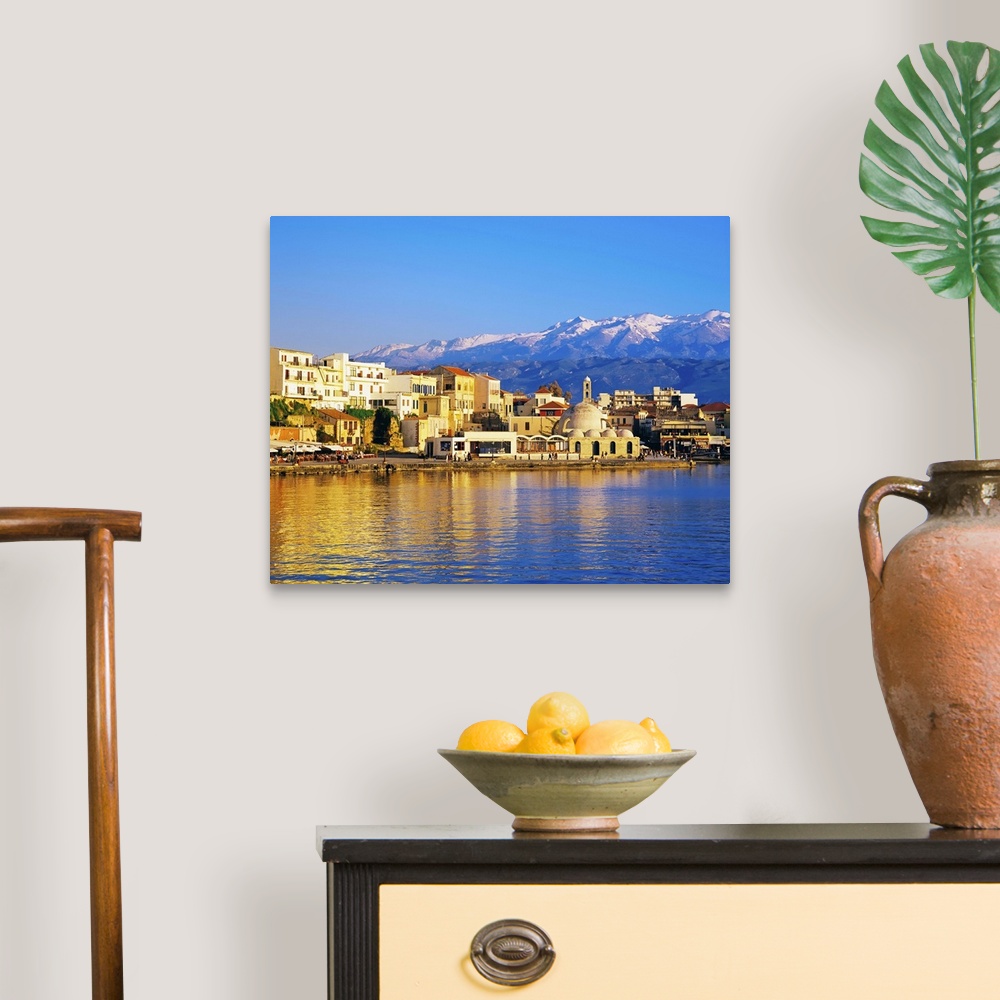 A traditional room featuring Chania waterfront and mountains in background, Chania, Crete, Greece, Europe