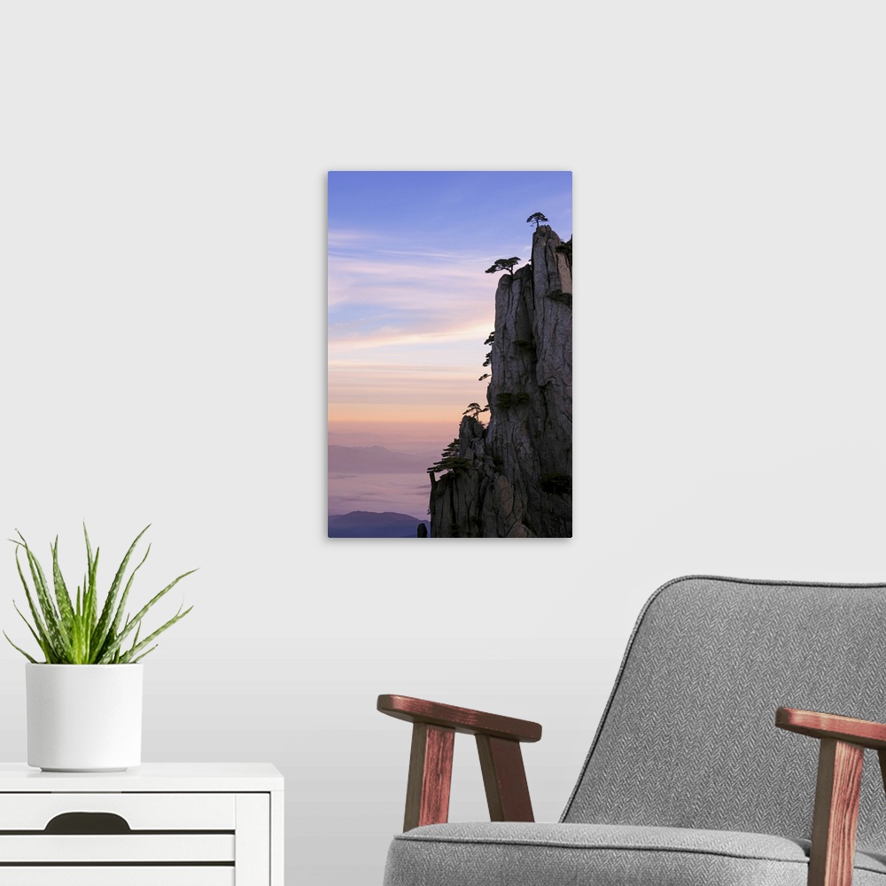 A modern room featuring China, Anhui, Huangshan. Sunrise over the famous Huangshan (yellow) mountains