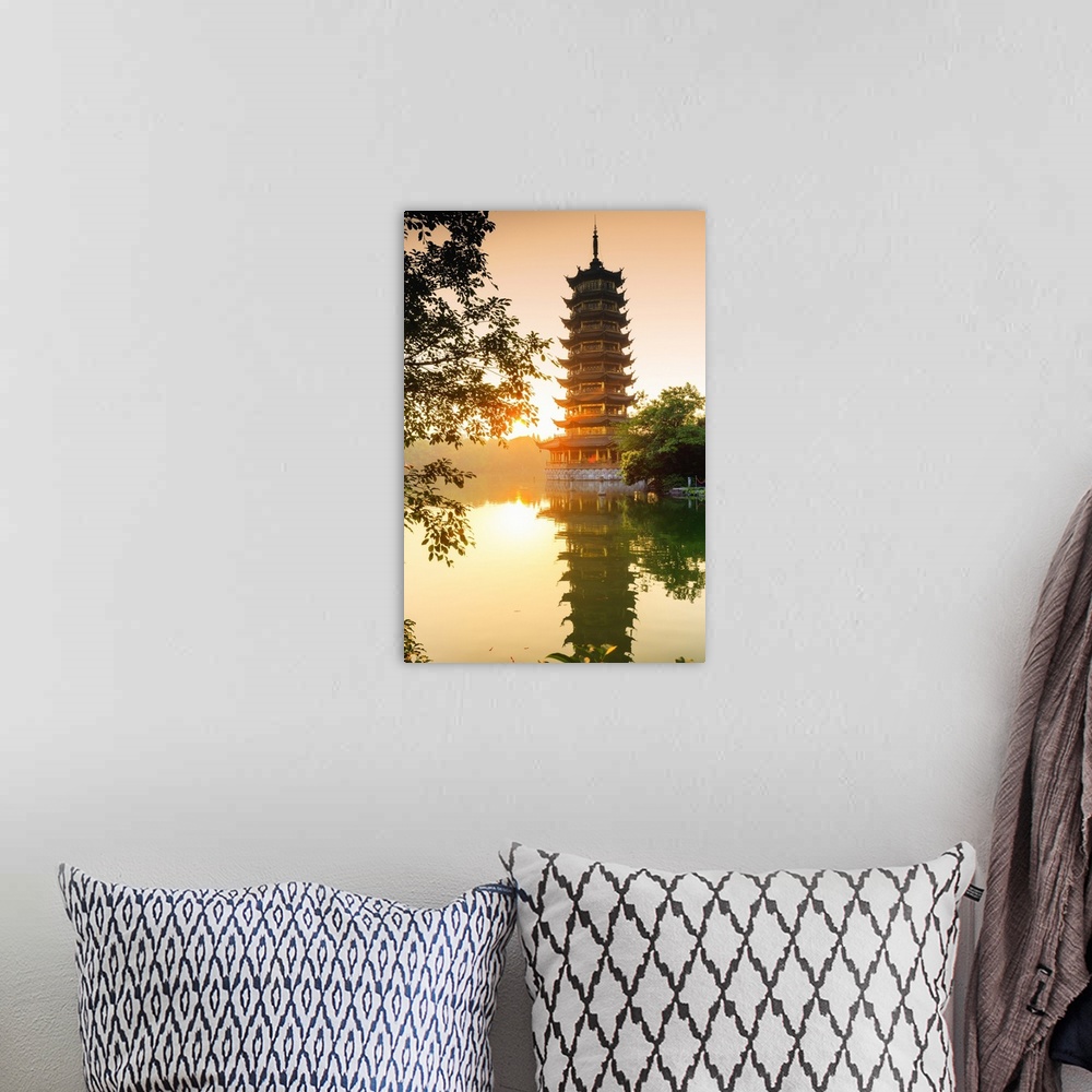A bohemian room featuring China, Guangxi province, Guilin, Banyan Lake Pagodas.