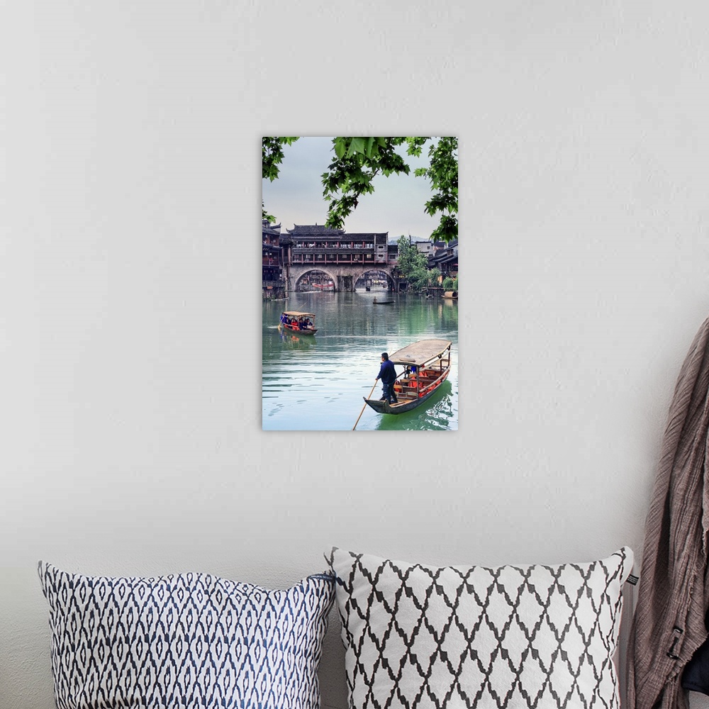 A bohemian room featuring China, Hunan province, Fenghuang, riverside houses.