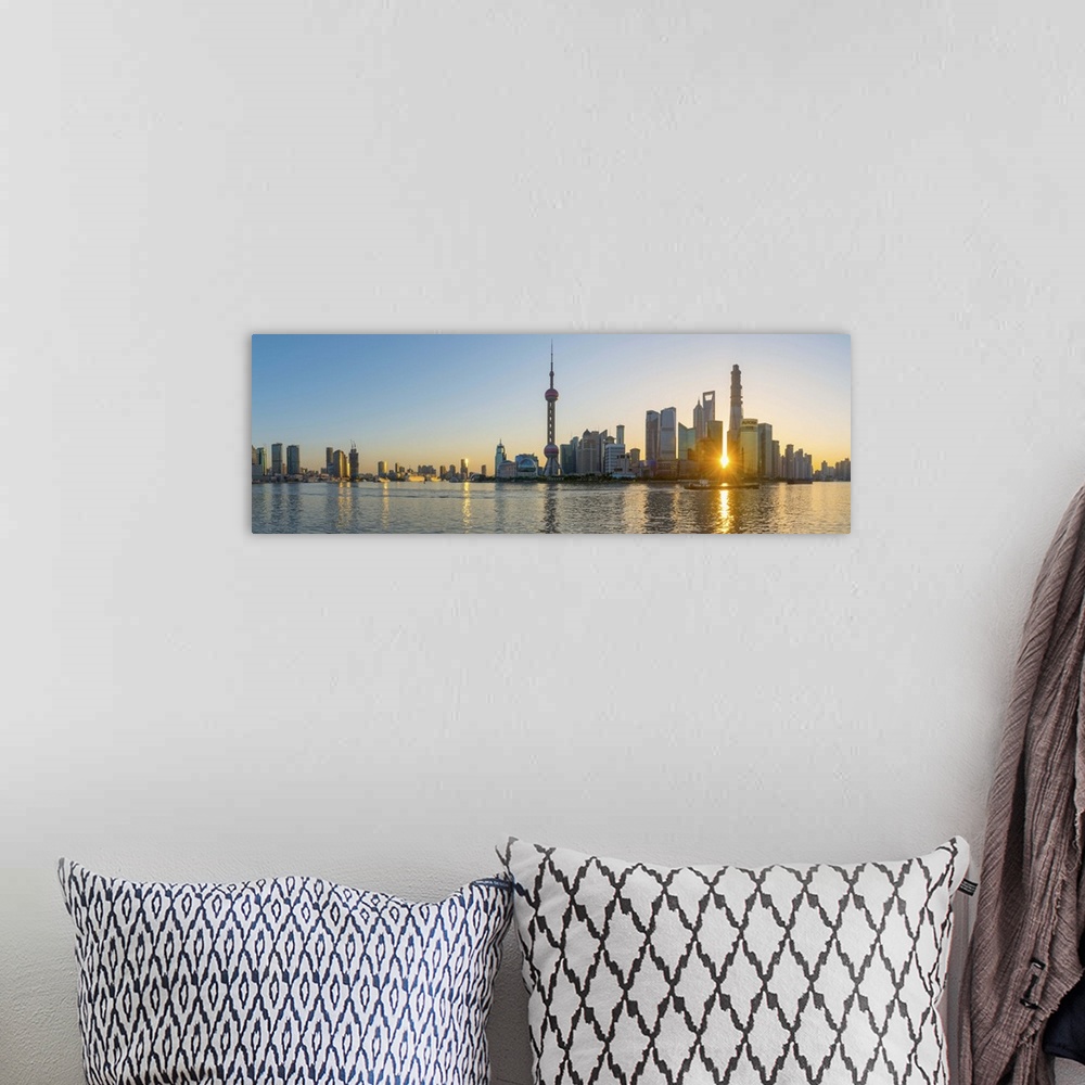 A bohemian room featuring China, Shanghai, Pudong District, Skyline of the Financial District across Huangpu River at sunrise