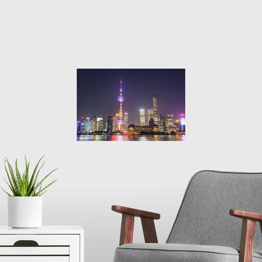 A modern room featuring China, Shanghai, The Bund, Pudong Skyline across the Huangpu River.