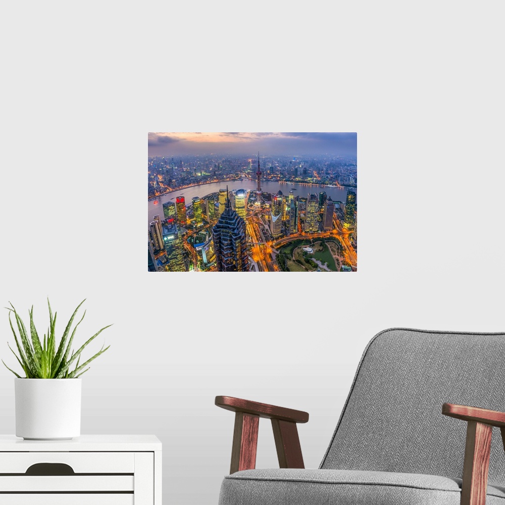 A modern room featuring China, Shanghai, View over Pudong Financial District, Huangpu River beyond