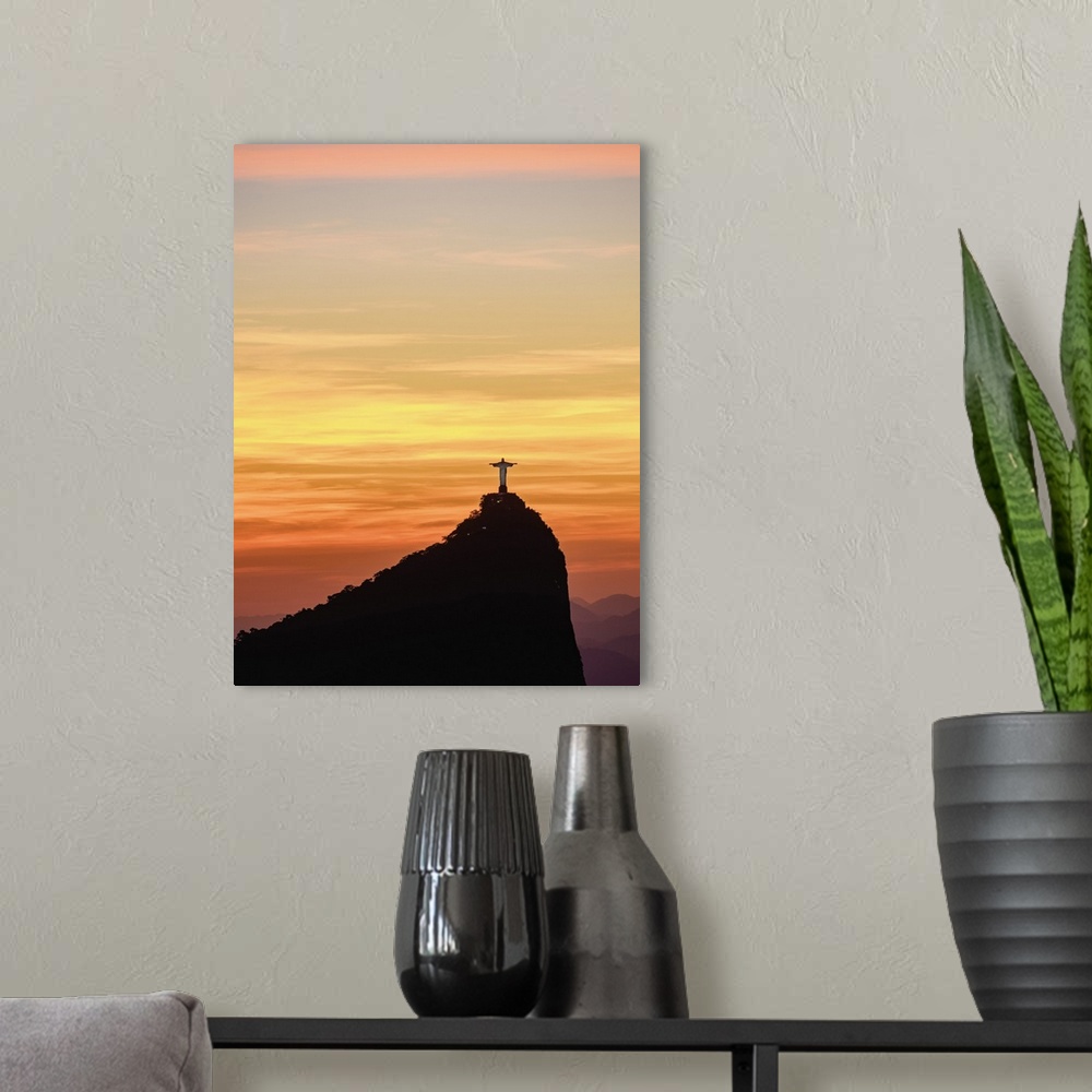 A modern room featuring Christ the Redeemer and Corcovado Mountain at sunrise, Rio de Janeiro, Brazil