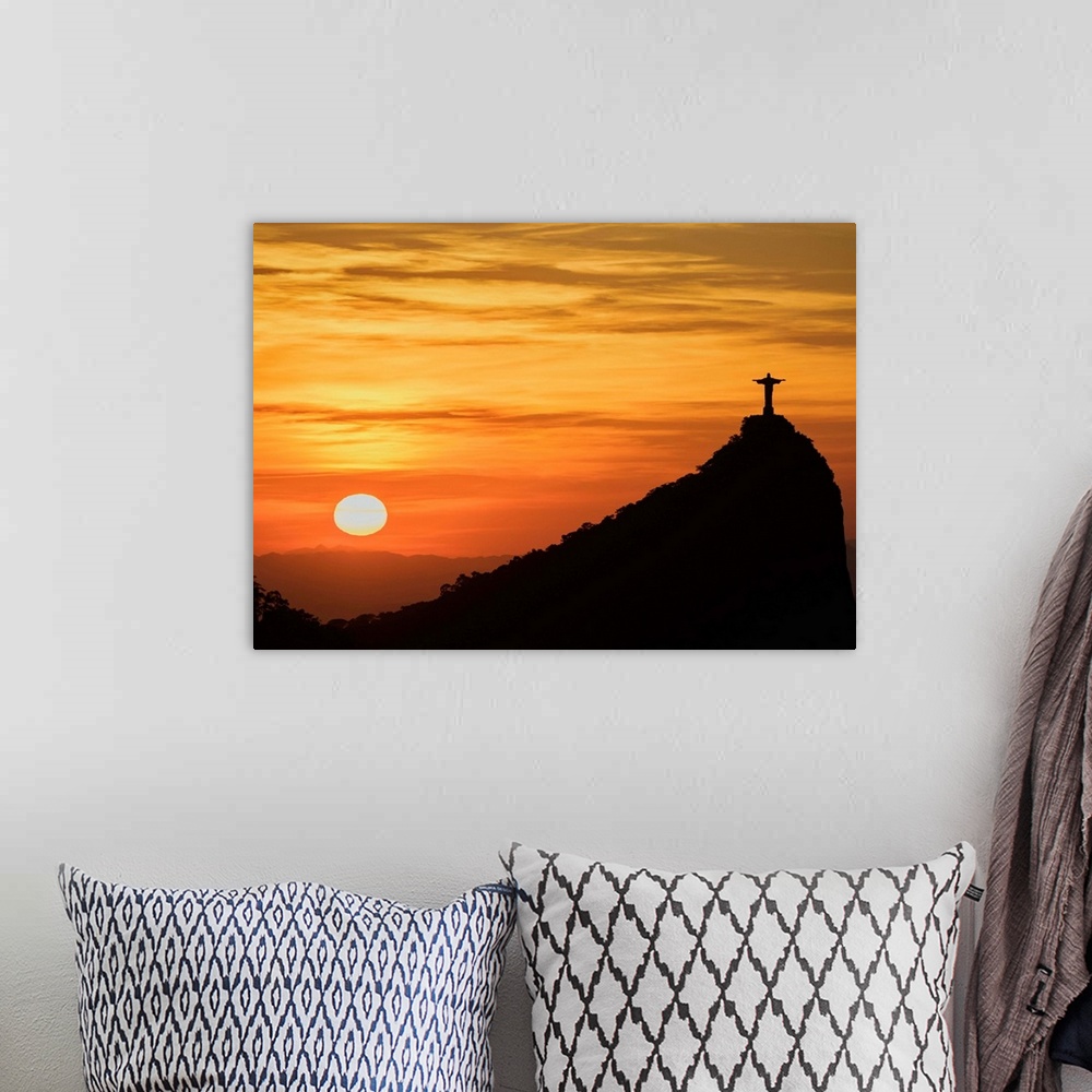 A bohemian room featuring Christ the Redeemer and Corcovado Mountain at sunrise, Rio de Janeiro, Brazil