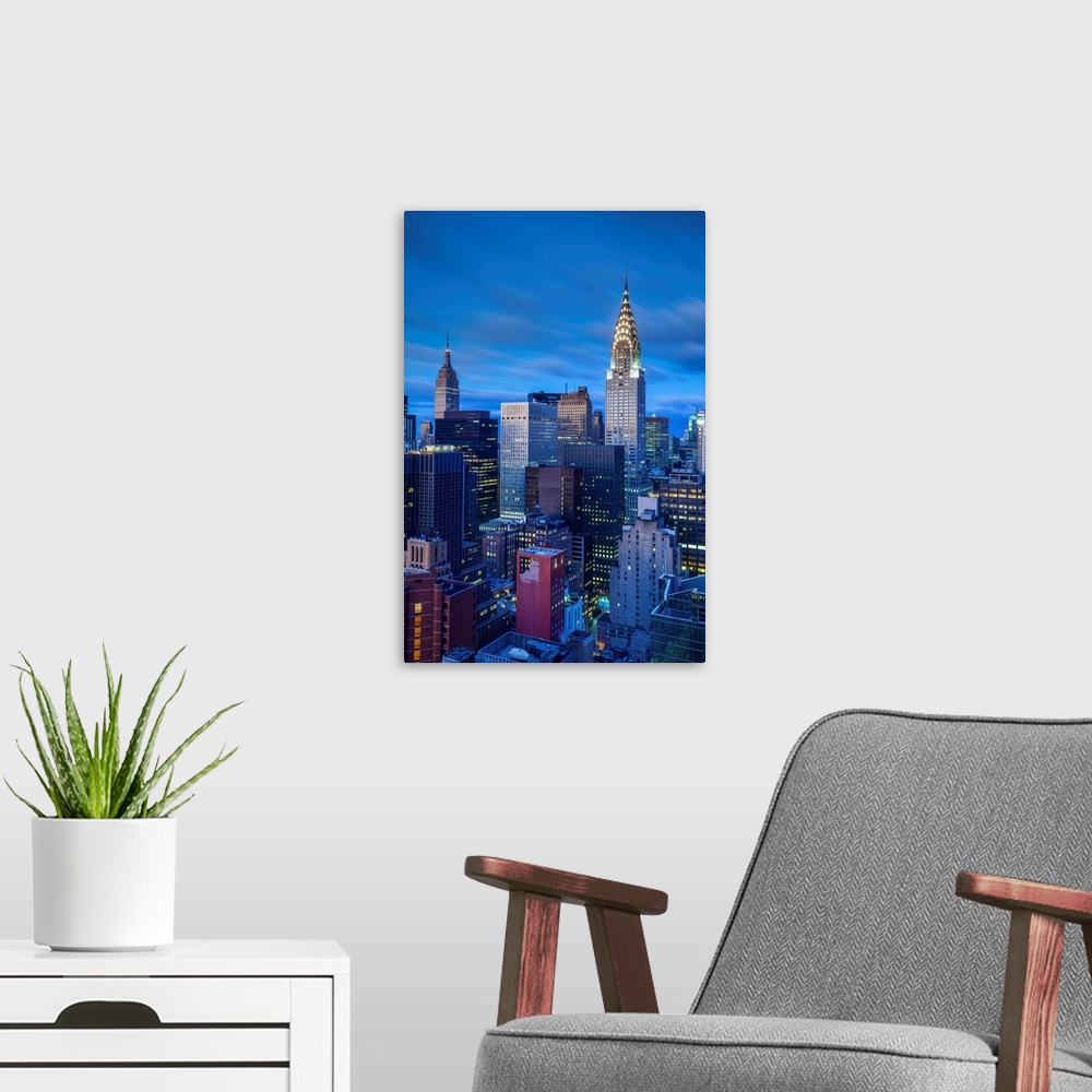 A modern room featuring Chrysler Building and Empire State Building, Midtown Manhattan, New York City, New York, USA.